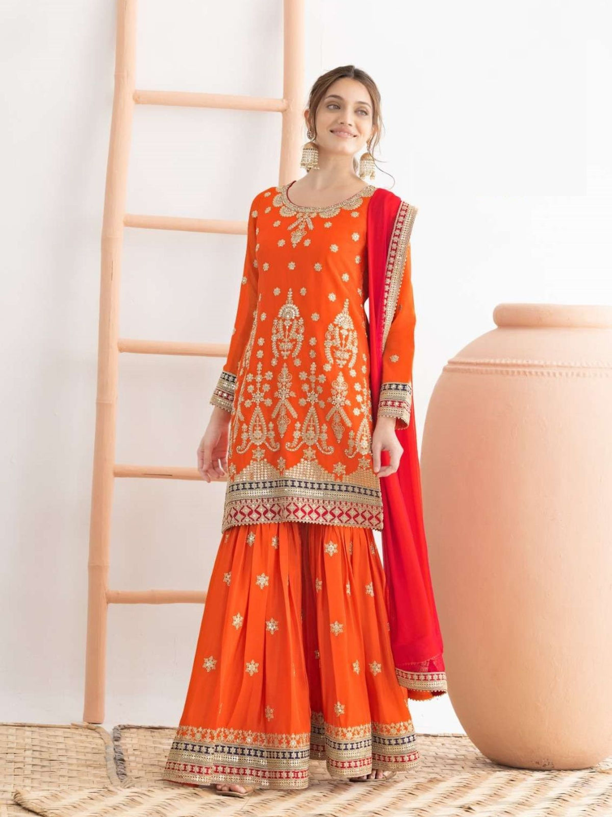 Orange Embroidered Sharara Suit In Chinon